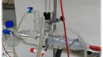 Termogravimetric Analysis system connected to a quadrupole mass spectrometer